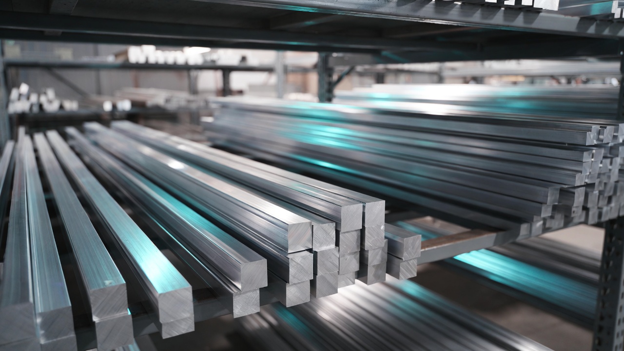Aluminum bar stock in a warehouse, the semi-finished form behind China aluminum exports to Mexico